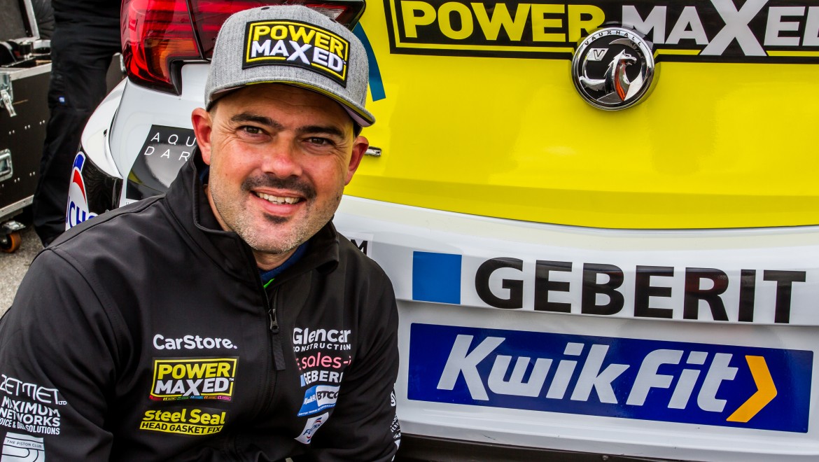 Michael Crees with BTCC racing car Michael Crees with BTCC racing car