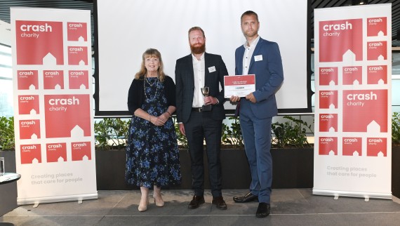 Kevin Higby and Steve Page accept CRASH award on behalf of Geberit Kevin Higby and Steve Page accept CRASH award on behalf of Geberit