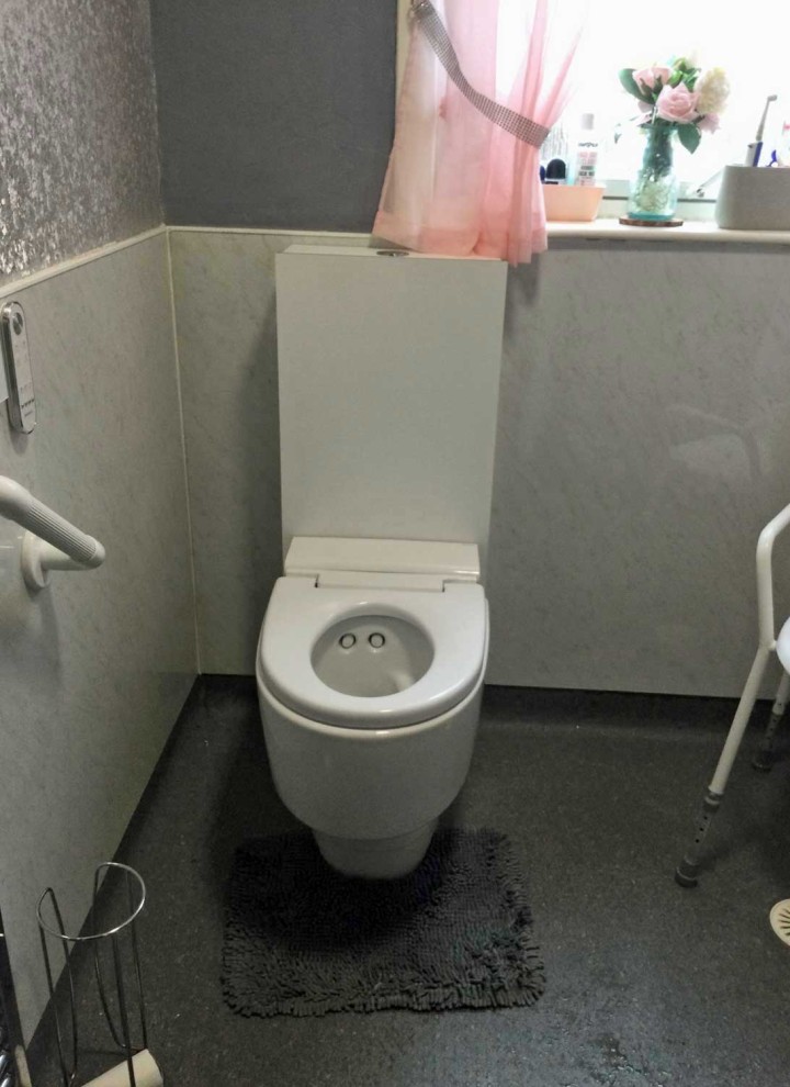 Geberit AquaClean Mera Care wash and dry toilet installed in a private bathroom