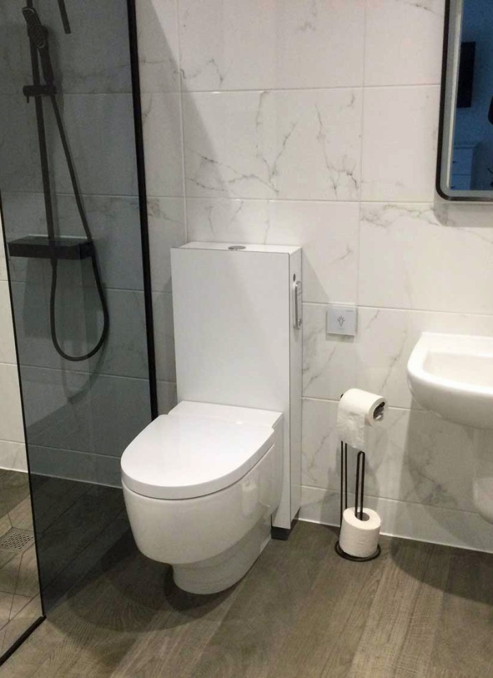 Geberit AquaClean Mera Care wash and dry toilet installed in a private bathroom