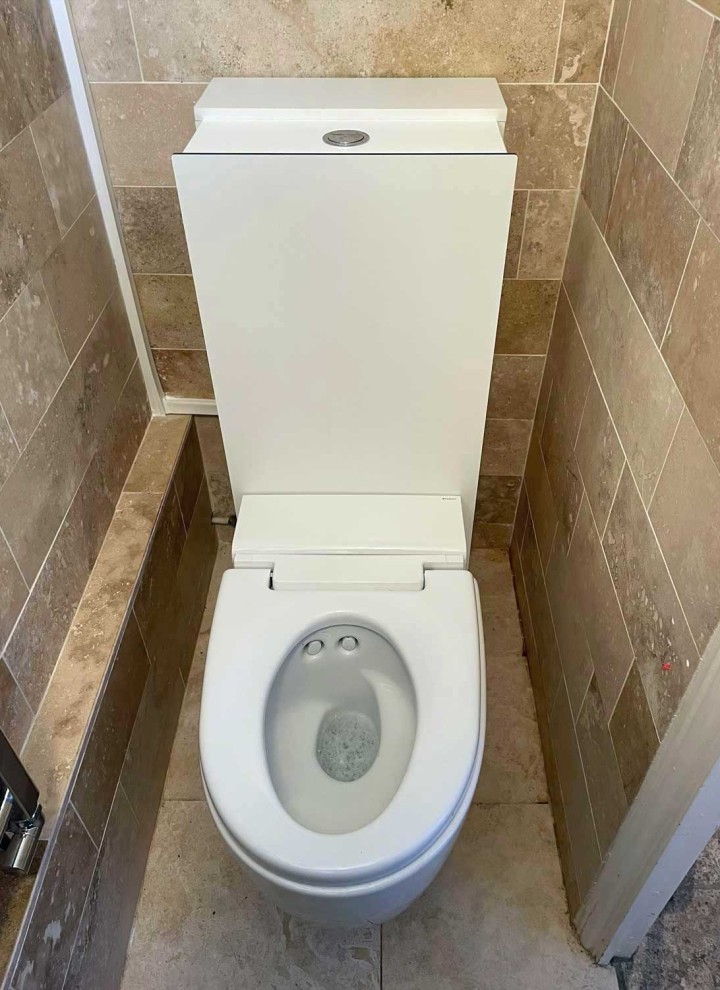 Geberit AquaClean Mera Care wash and dry toilet installed in a private bathroom