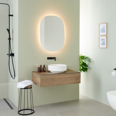 Geberit Option Oval mirror with VariForm lay-on washbasin and furniture