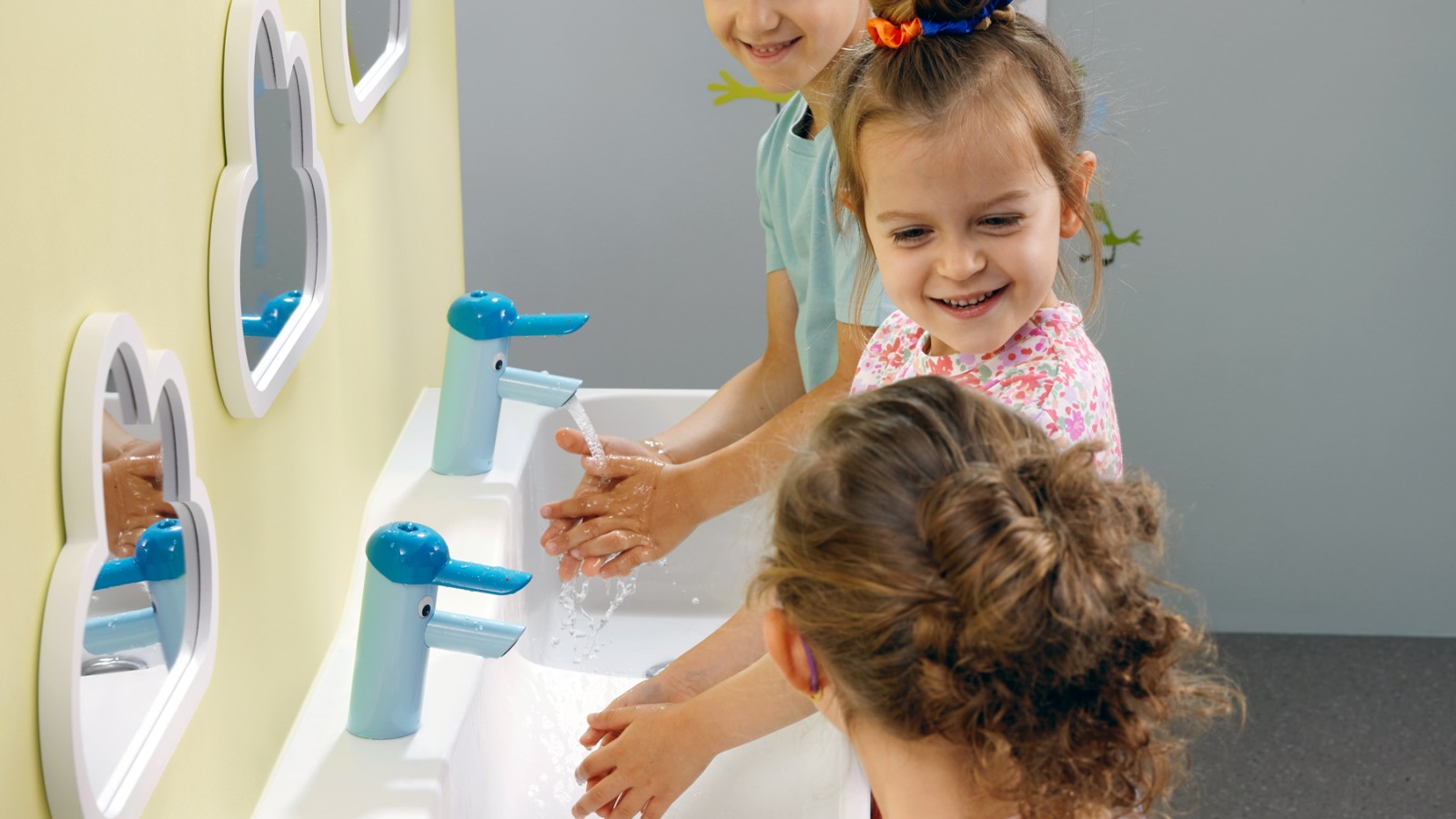 Children washing their hands