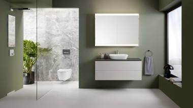 Bathroom with Geberit ONE glass walk-in shower panel, wall drain and niche storage box