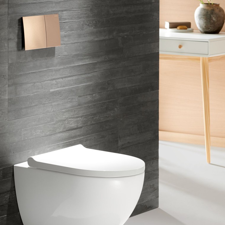 Geberit Acanto WC with Sigma70 flush plate in rose gold