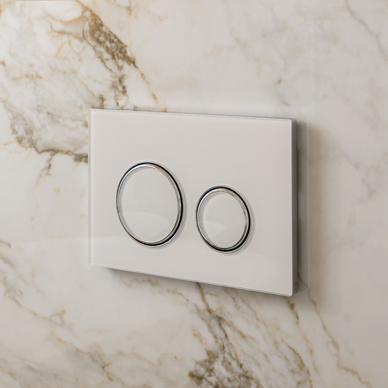 White Geberit Sigma50 actuator plate with design rings in silver