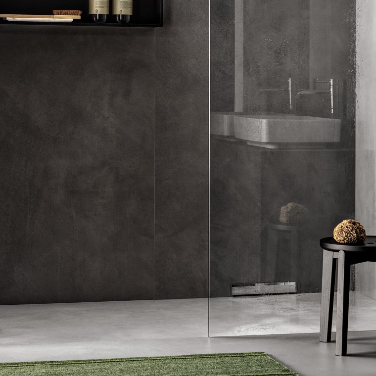 A floor-even shower with wall drain A floor-even shower with wall drain