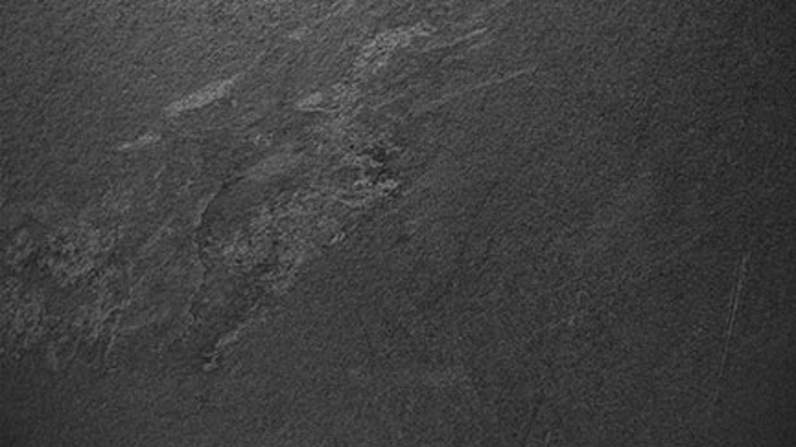 Monolith front cladding in stoneware slate Monolith front cladding in stoneware slate