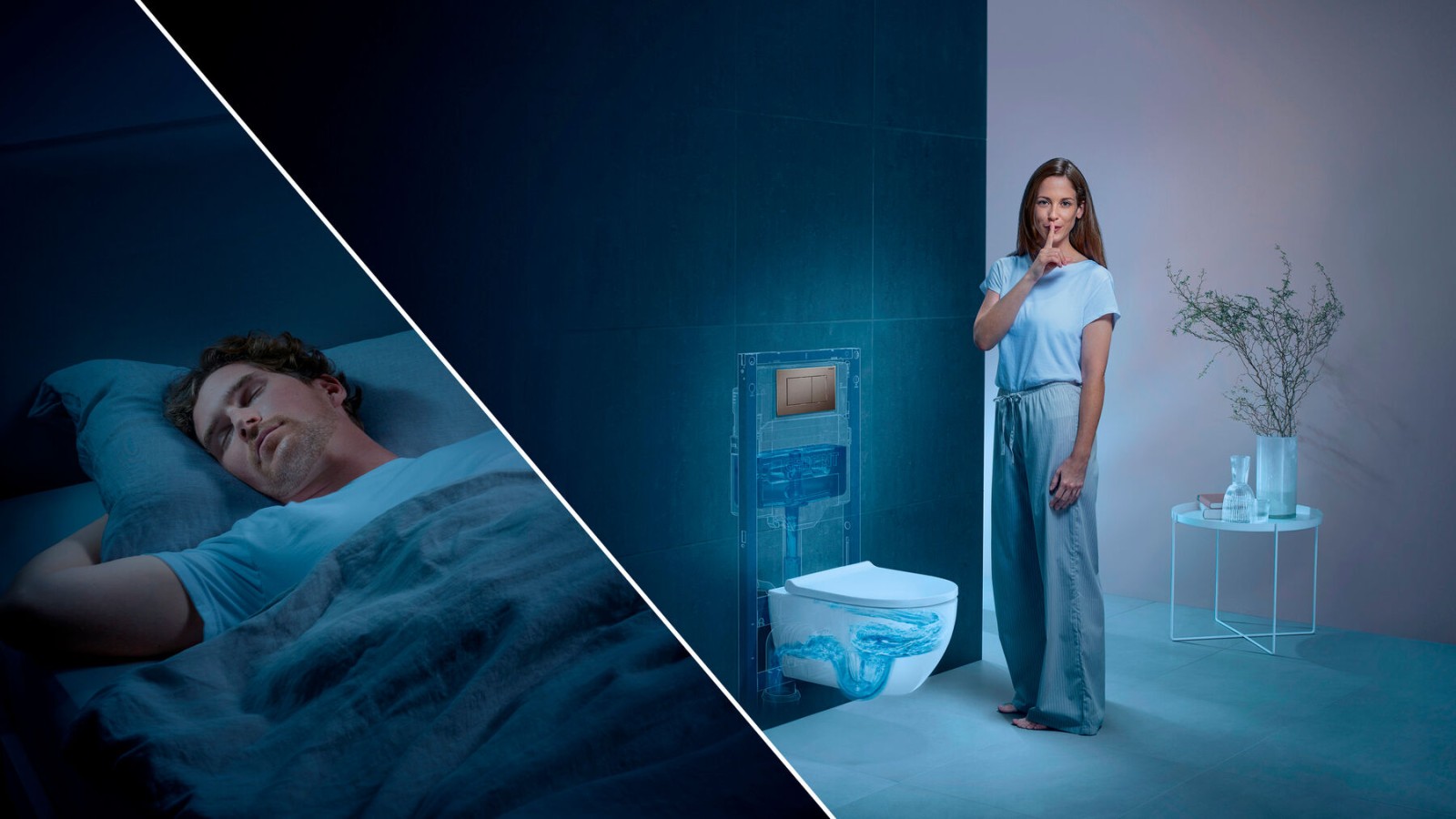 A man is sleeping in the bedroom while a woman flushes the toilet in the bathroom.