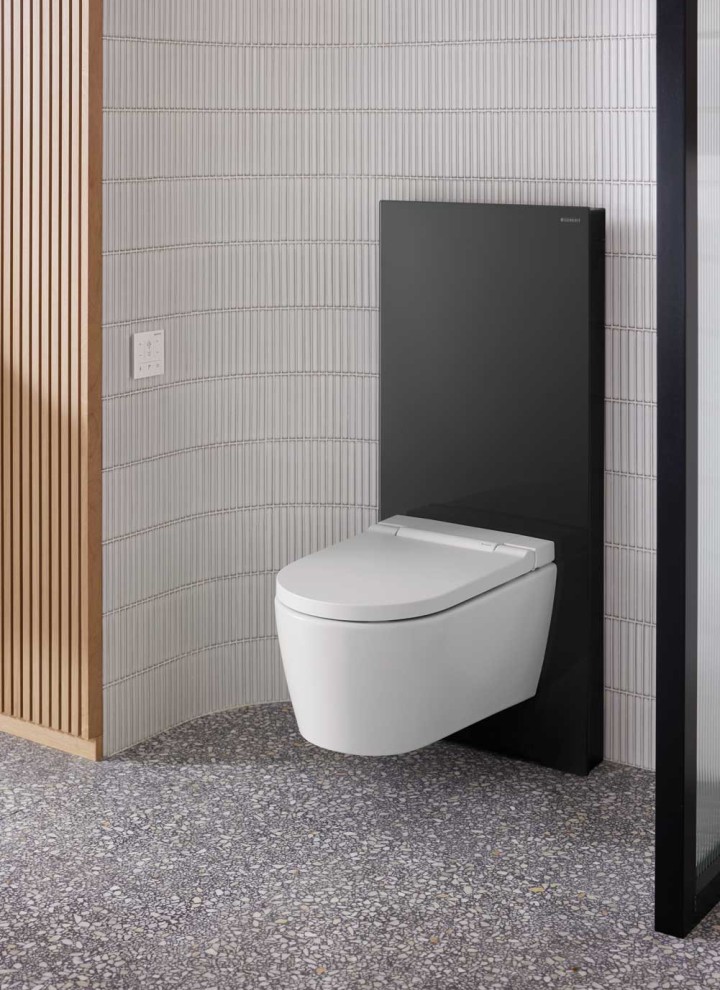 Bathrom with black Geberit Monolith and shower toilet Geberit AquaClean Sela