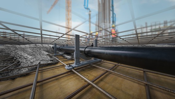 Geberit PE branch discharge pipe embedded in concrete