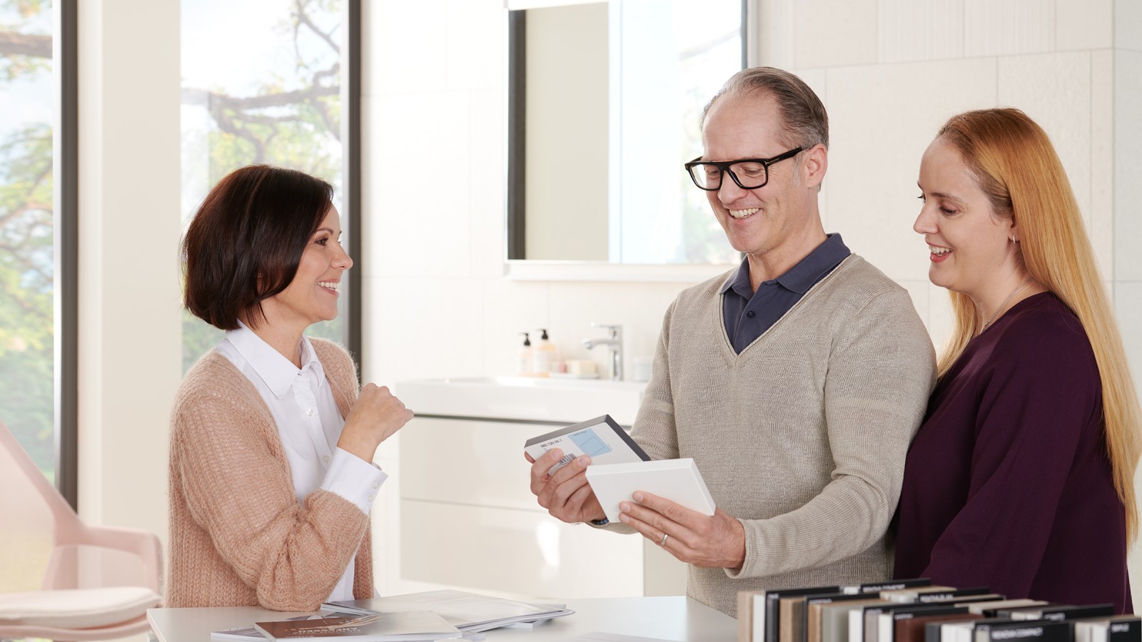 People in a Geberit showroom