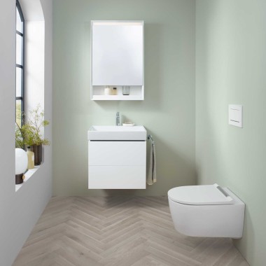 Geberit ONE washbasin area with small handrinse basin, washbasin cabinet and mirror cabinet, plus a shower toilet.