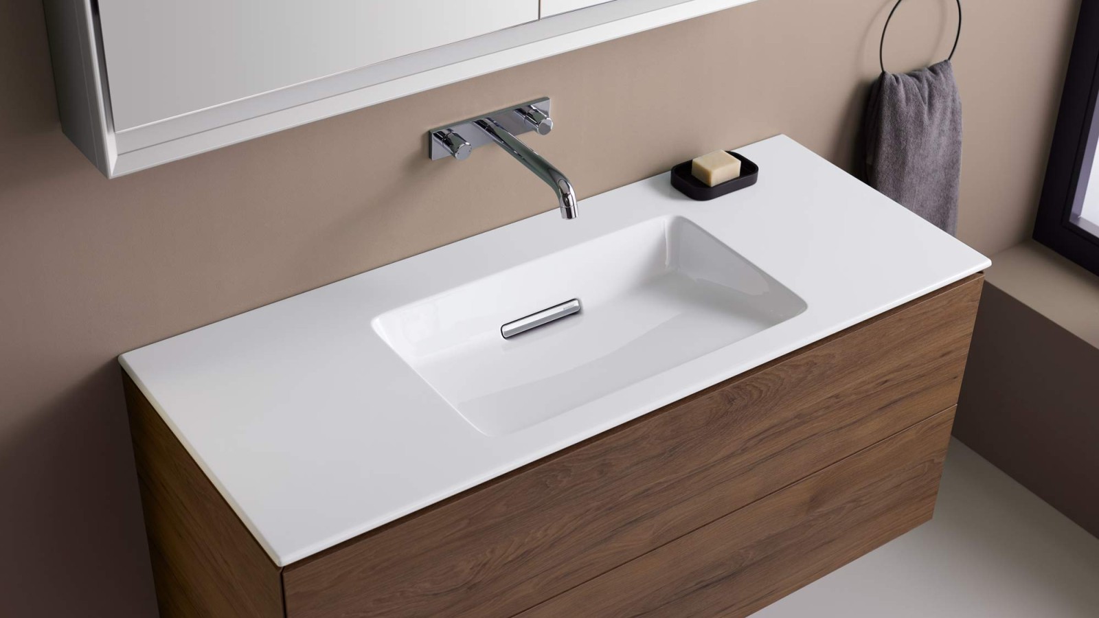 Geberit ONE washbasin with slim-rim washbasin and cabinet in walnut brown