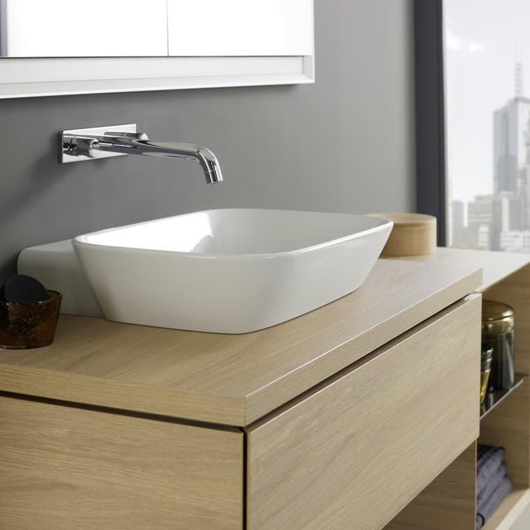 Washplace with Geberit ONE lay-on washbasin and bathroom furniture made of wood Washplace with Geberit ONE lay-on washbasin and bathroom furniture made of wood
