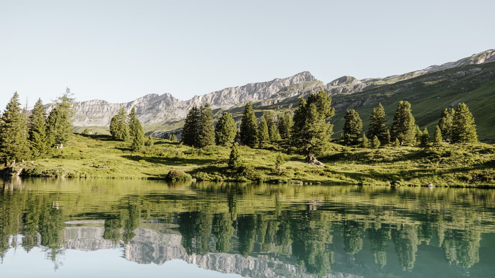 Reflections in the Swiss mountain lake Engstlensee at 1,835 metres above sea level. Photographer: Bruno Augsburger (© Geberit) Reflections in the Swiss mountain lake Engstlensee at 1,835 metres above sea level. Photographer: Bruno Augsburger (© Geberit)
